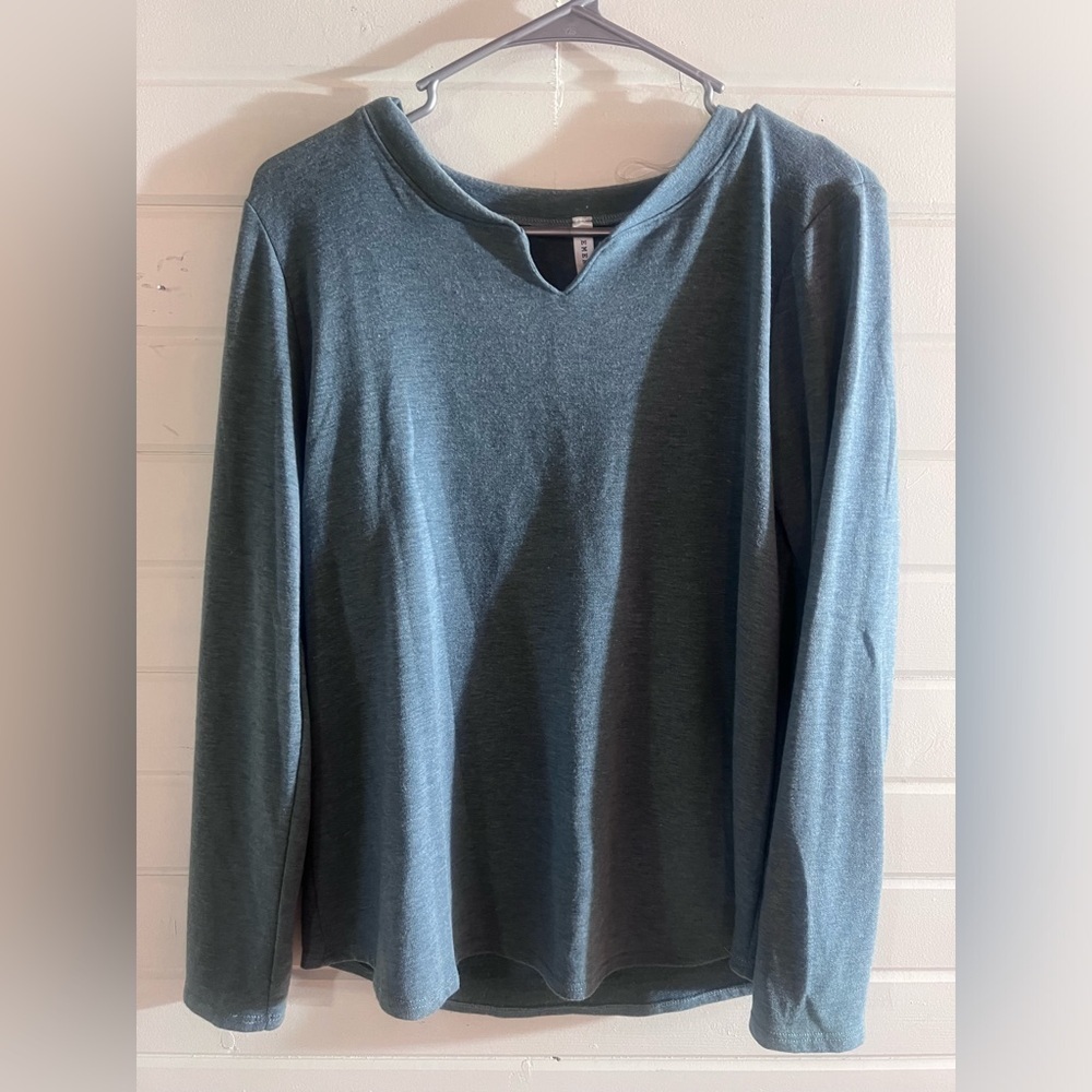 Greenish/bluish top, never worn, tags off.